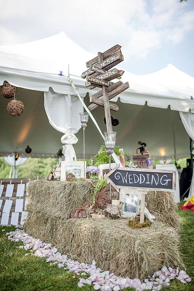country wedding wooden signs decorated with hay bale sara lobla photography
