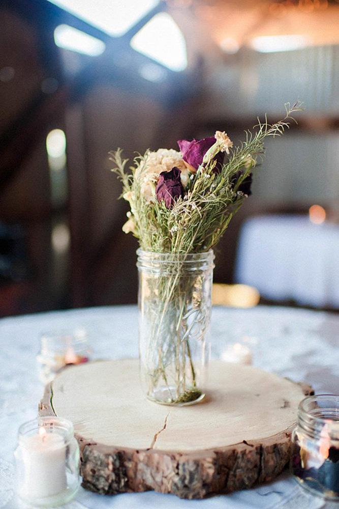 country wedding woodland slice with dry flower centerpiece tony gambino photography