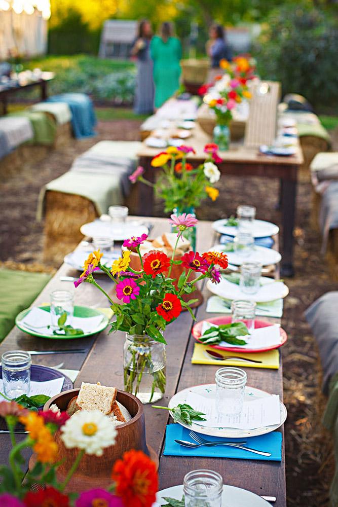 country wedding woodland tables with bright cloth and flowers nate luke and blaine moats