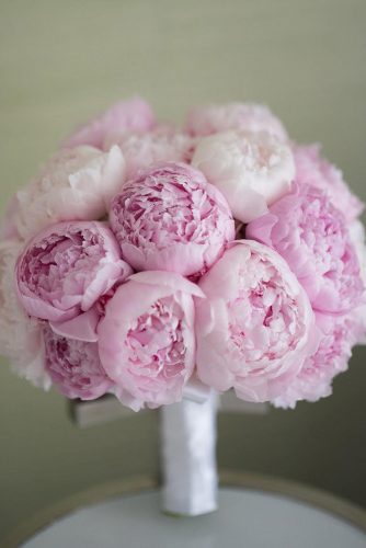 pink wedding bouquets small with peonies and silk white ribbons johnandjoseph