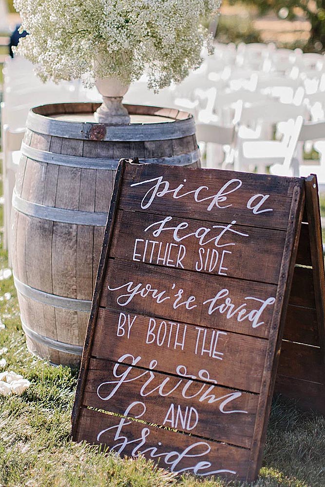 popular wedding signs popular inscription on a wooden board wine barrel with baby breath