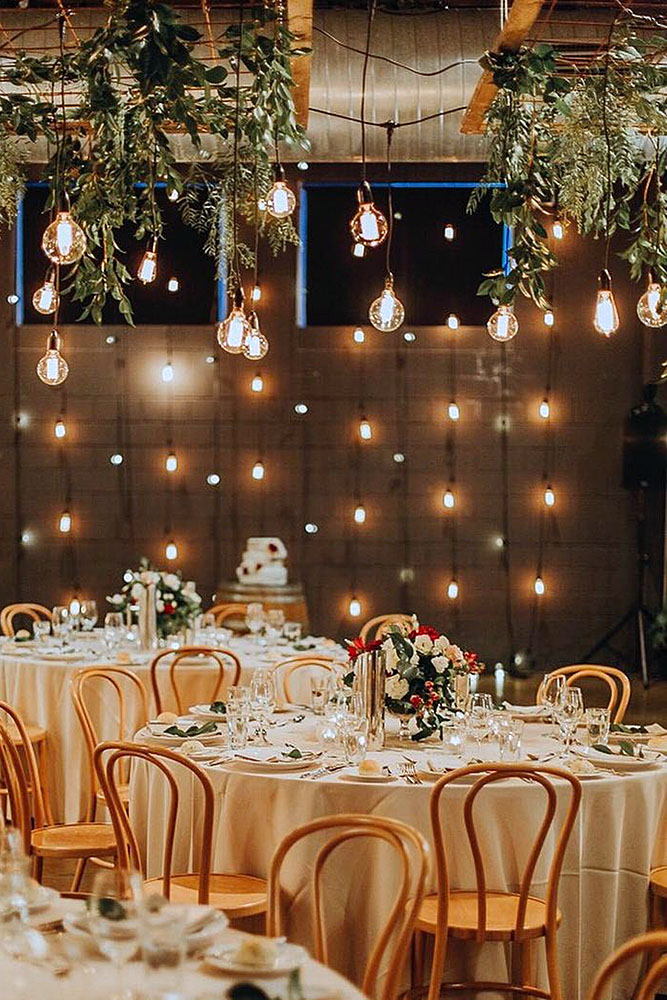 wedding light reception decorated with light bulbs and luminous garlands avideas event designers via instagram