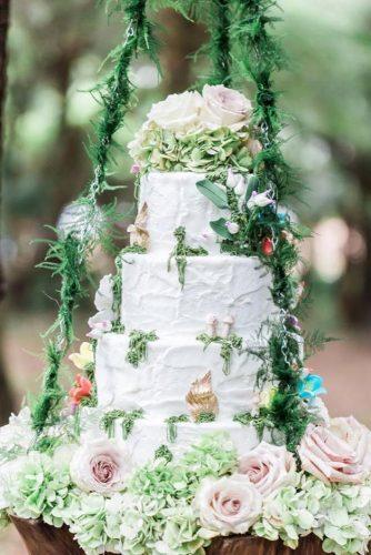 woodland themed wedding cakes white creamy with greenery and blush flowers rising lotus photography