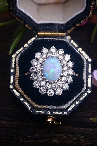opal engagement rings double halo floral oval cut