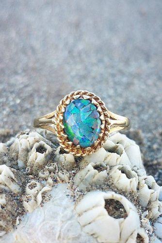 opal engagement rings oval cut gold halo split