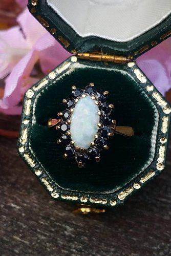 opal engagement rings oval cut rose gold floral vintage