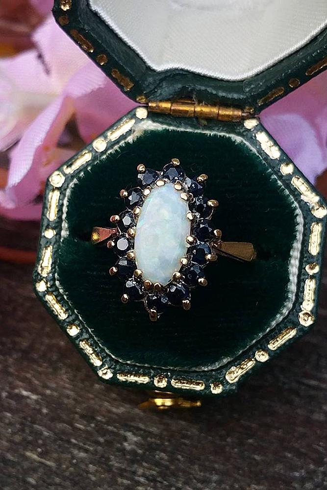opal engagement rings oval cut rose gold floral vintage