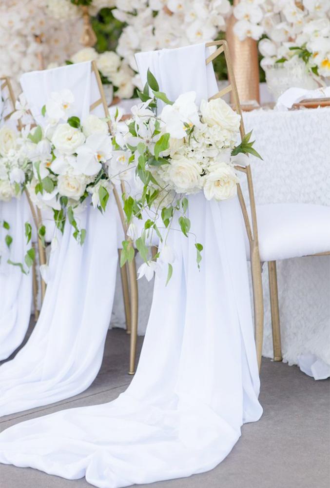 simply chic wedding flower decor idea white chairs decor elizabethannedesigns