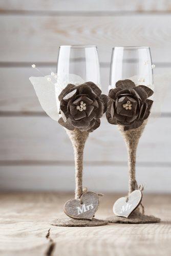 wedding glasses with lien rope burlap flowers and wooden hearts inesesweddinggallery via instagram