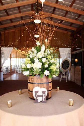 wine barrels wedding table centerpieces with flowers
