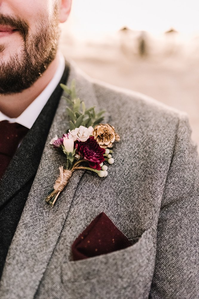 burgundy wedding details on grey groom suit gregfinck