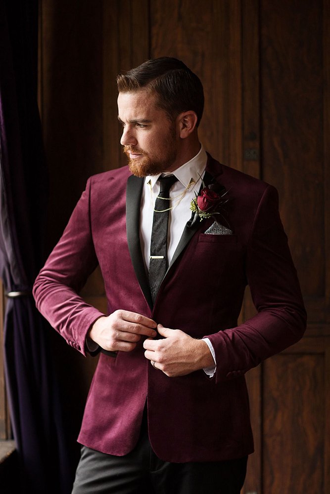 burgundy wedding groom suit with black collar tie and flower buttonhole capture the canvas photography