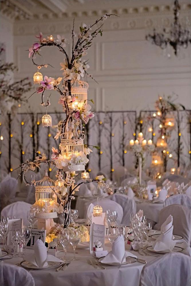 disney wedding centerpiece tall centerpieces with lighting candles and flowers firenzafloraldesign