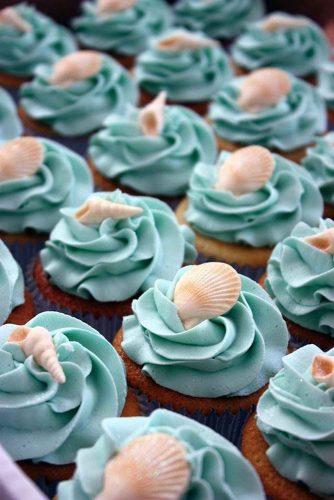 disney wedding cupcakes with blue cream and seashell decor retro bakery