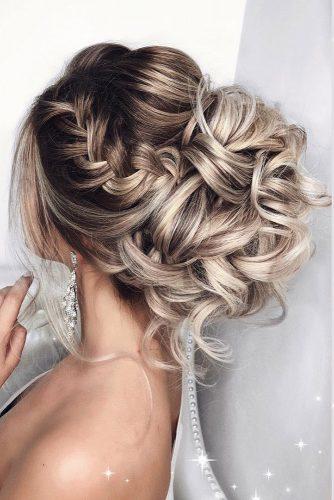 elstile wedding hairstyles high curly bun with side braids