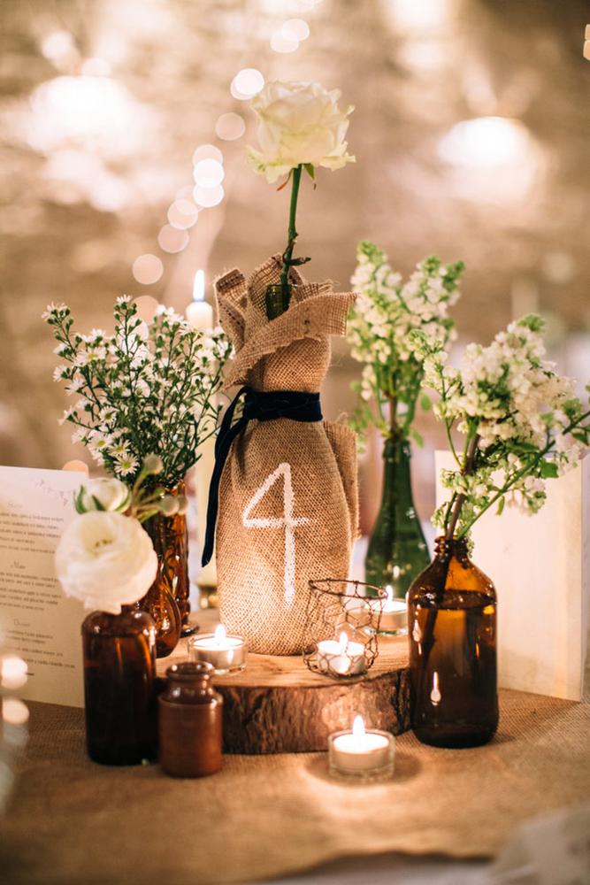 rustic wedding centerpieces burlap white flowers and candles frasersteartphotography