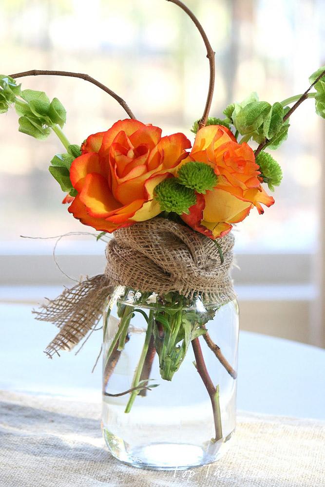 rustic wedding centerpieces orange flowers in jar with burlap duke manor farm