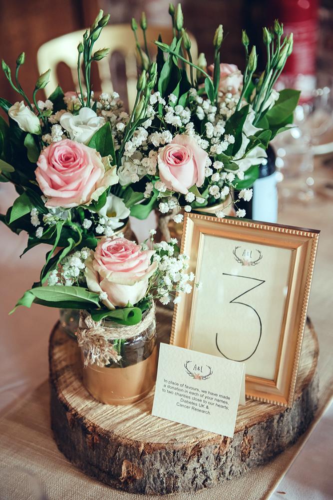 rustic wedding centerpieces pink roses and baby breath in glass jars lisa howard