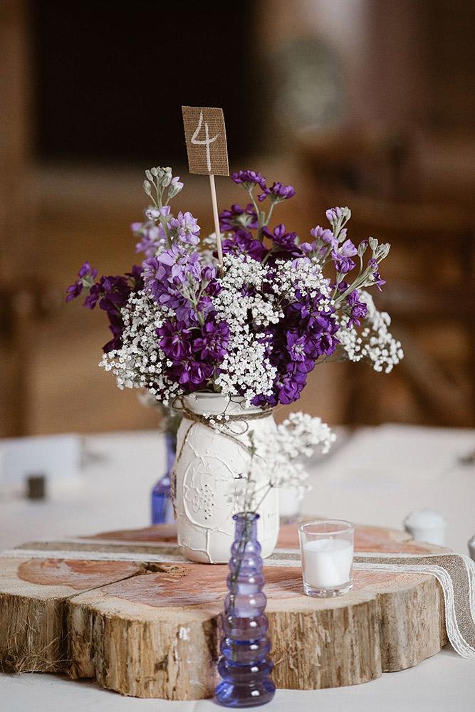 rustic wedding centerpieces white mason jar with lilac and baby breath erin morrison photography