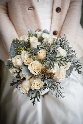 winter wedding bouquets with white roses greenery and crystals genevieve nisly photography