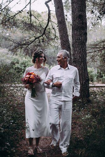 father leads the bride to the wedding altar lorena erre photography