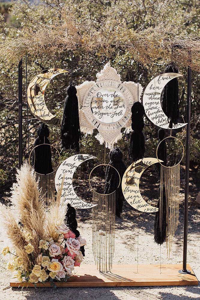 bohemian decor ideas place setting stand with moons and dream catchers and signs