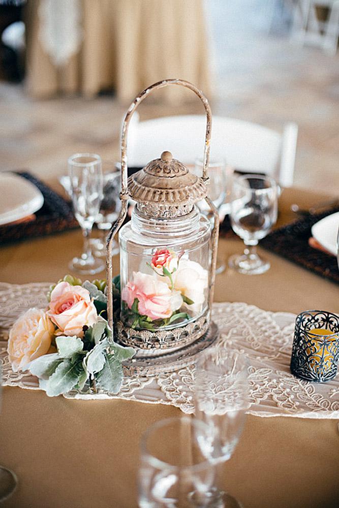 bohemian décor ideas centerpiece ethnic lantern with pink roses tiffani jones photograhpy