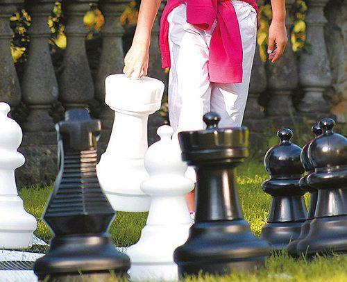 wedding reception games girl playing giant chess
