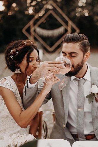 wedding splurges drinking wine reception