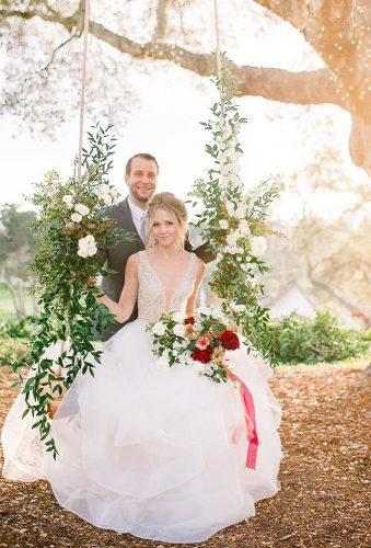 wedding photographers bride on swing dejoyphotography