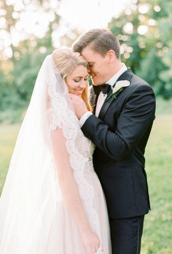wedding photographers cute groom embrace laurenfair