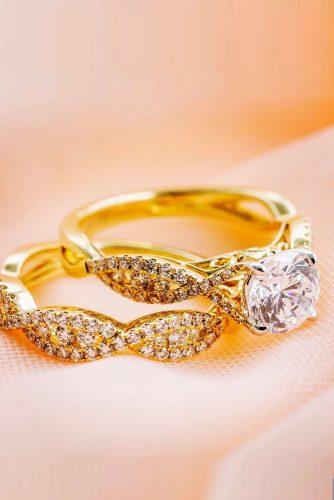 engagement ring trends twisted bands round cut diamond sparkling