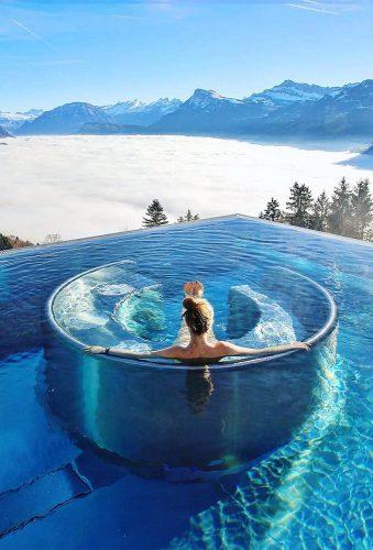 unique honeymoon destinations pool in mountains switz.tops