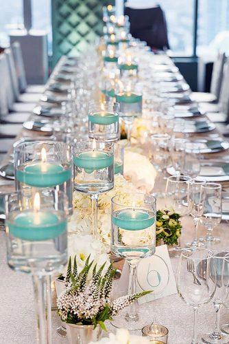 tiffany blue wedding decorations candels in glass with water colin cowie