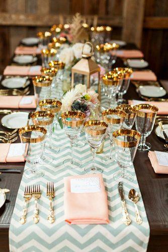tiffany blue wedding decorations elegant reception table with gold dishes and lanterns a brit and a blonde