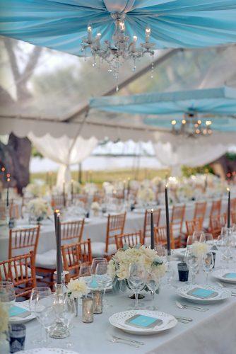 tiffany blue wedding decorations elegant reception under tent with white flowers and black candles liz banfield