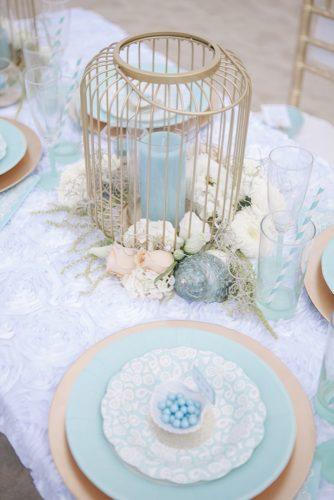 tiffany blue wedding decorations for table with candle in gold cage studio 11 weddings