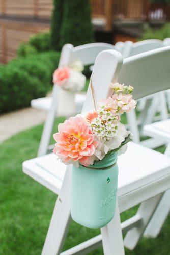 tiffany blue wedding decorations mason jar with peach flowers decorate the aisle brooke photography and design