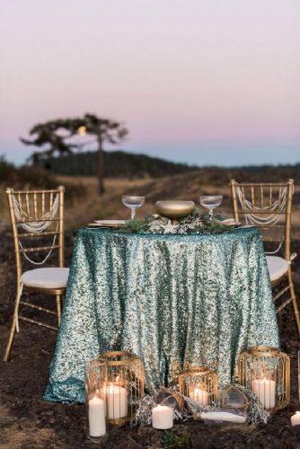 tiffany blue wedding decorations outdoor table with glitter tablecloth and gold details jones photography