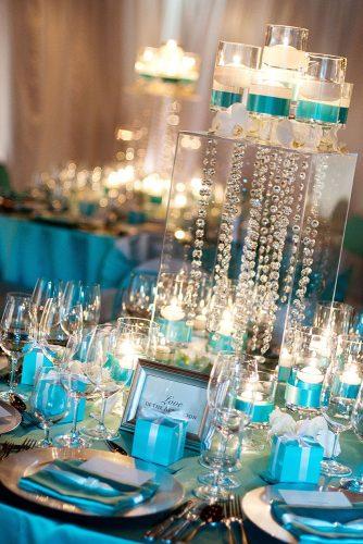 tiffany blue wedding decorations table with candles ribbons crystals and flowers visionari