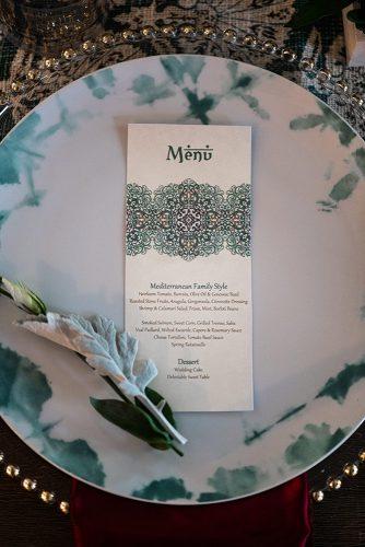 arabic wedding menu with blue oriental patterns and font on the plate Madi Photograph