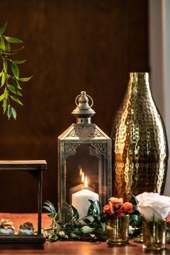 arabic wedding oriental bridal decoration lantern with candle white roses greenery madi photograph