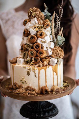 arabic wedding white drip cake with oriental sweets madi photograph