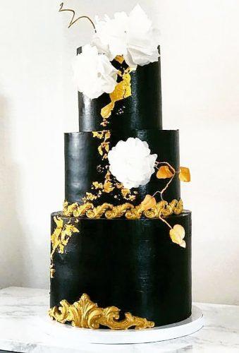 black wedding cake cake with gold whote flower nadinaameenmcq