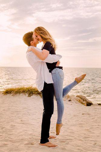 beach photoshoot movie inspired shot couple kissing at the beach