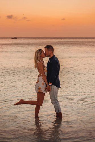 beach photoshoot on the beach photoshoot man and woman kissing