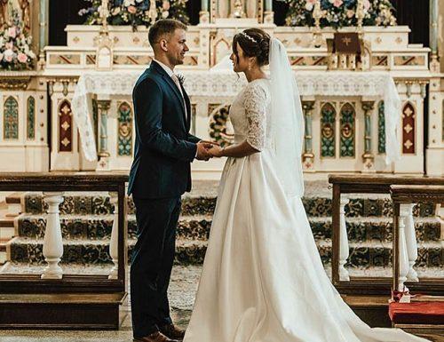 catholic wedding vows newlyweds at the church juliananoellejumper min