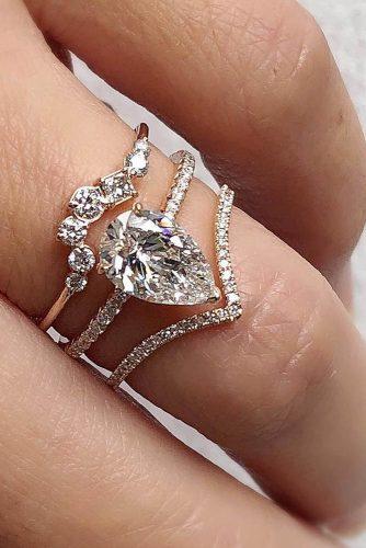 engagement ring designers pear shaped diamond engagement rings pave band trabertgoldsmiths
