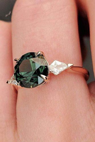 engagement ring designers unique engagement rings in rose gold green sapphires diamonds cushlawhitingjewellery