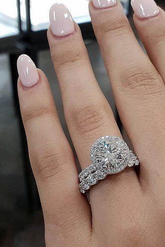 engagement ring designers wedding ring set bridal diamond set halo white gold jacquefinejewellery